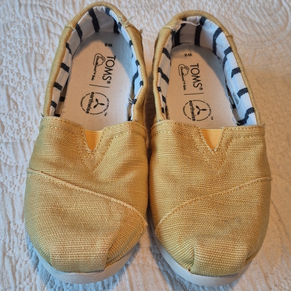 Toms women's size 6 yellow slip on shoes Freshly washed and air dried GUC